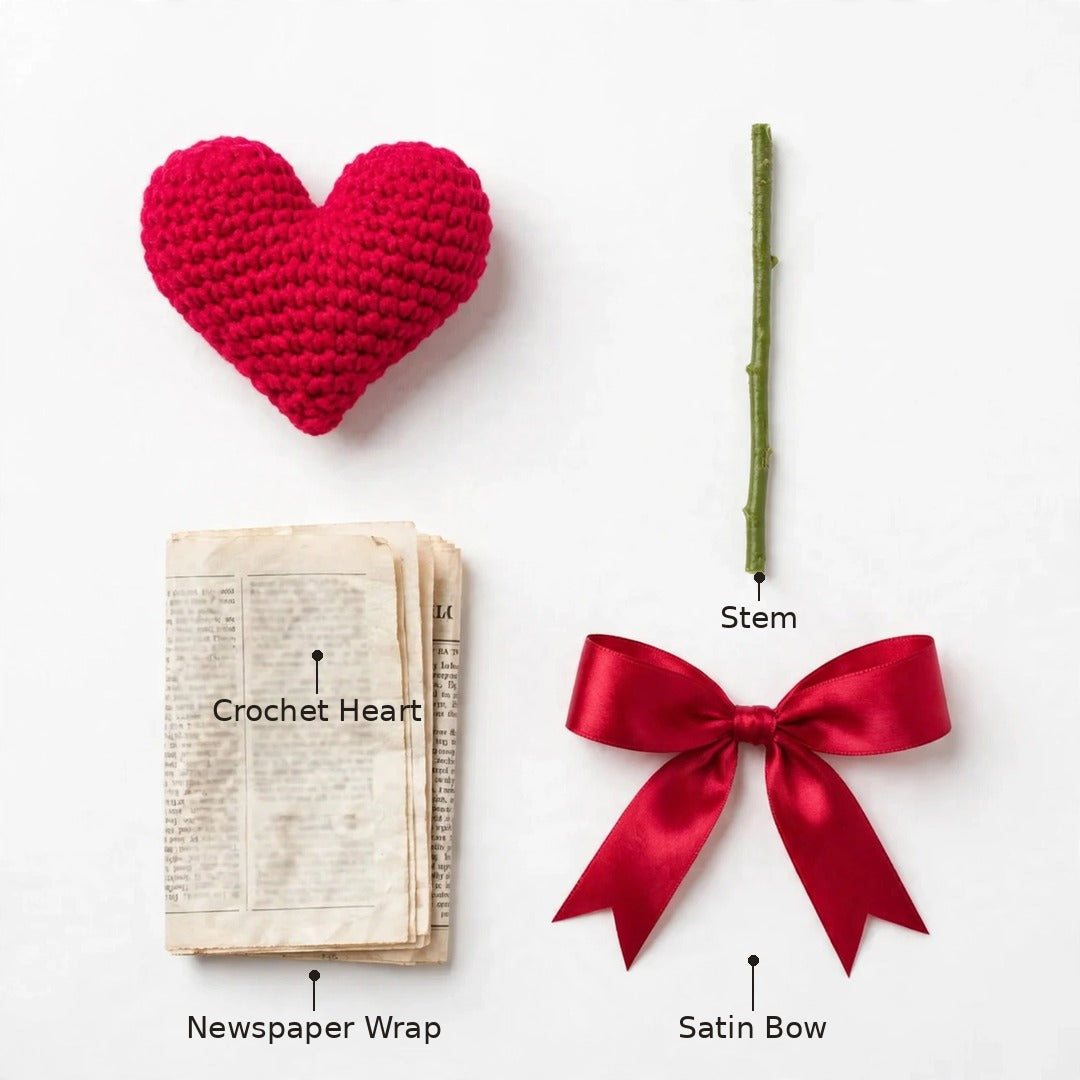 Single Heart-Shaped Flower with Newspaper Wrapping and Red Ribbon Bow