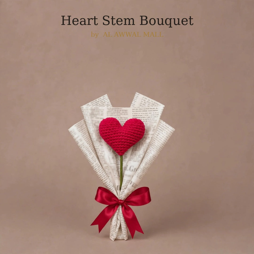 Single Heart-Shaped Flower with Newspaper Wrapping and Red Ribbon Bow
