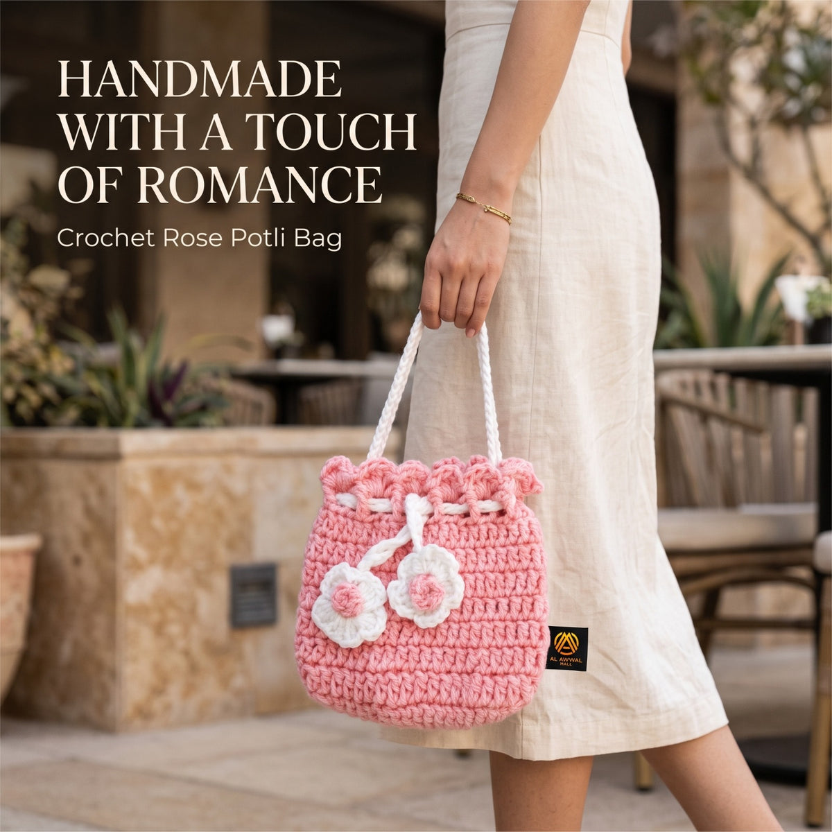 Handmade Crochet Pink Potli Bag with White Floral Details and Drawstring Cord