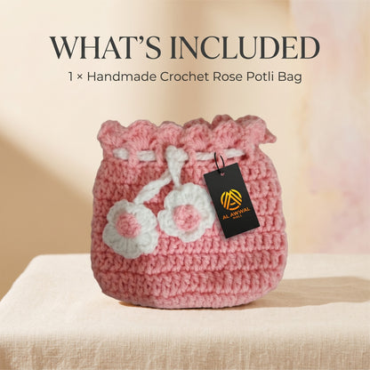 Handmade Crochet Pink Potli Bag with White Floral Details and Drawstring Cord