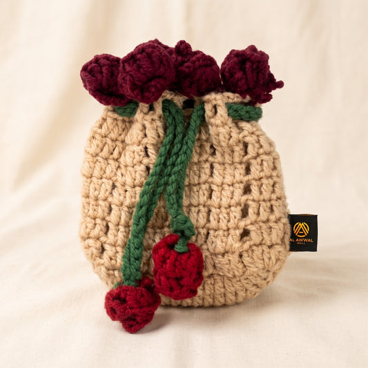 Handmade Crochet Potli Bag in Beige with Rose Floral Border and Green Drawstring